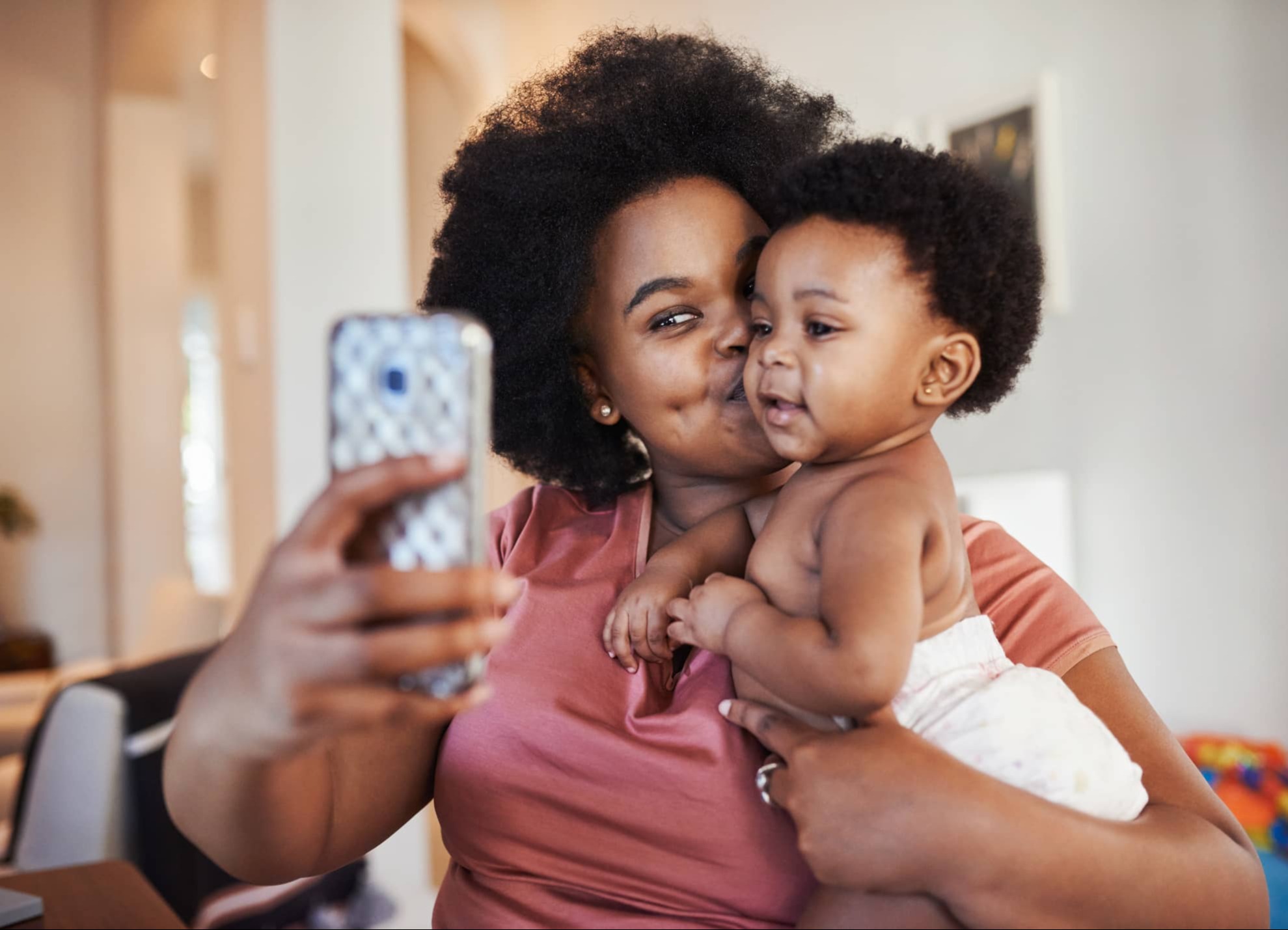 mom taking selfie with baby